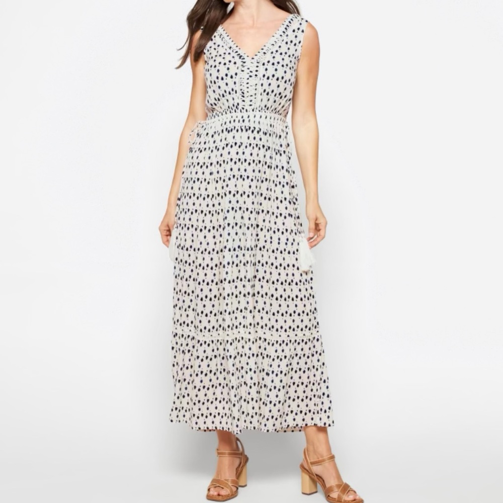 Dress with tassels on the sides